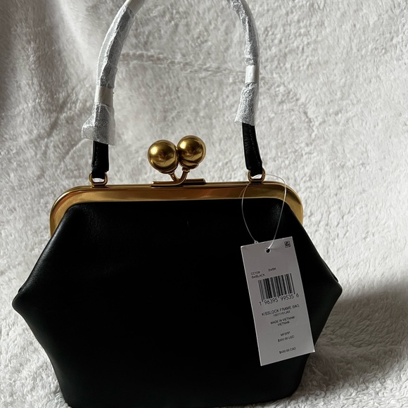 Coach Handbags - Black Coach Kisslock 16 Frame Bag with Gold Accents